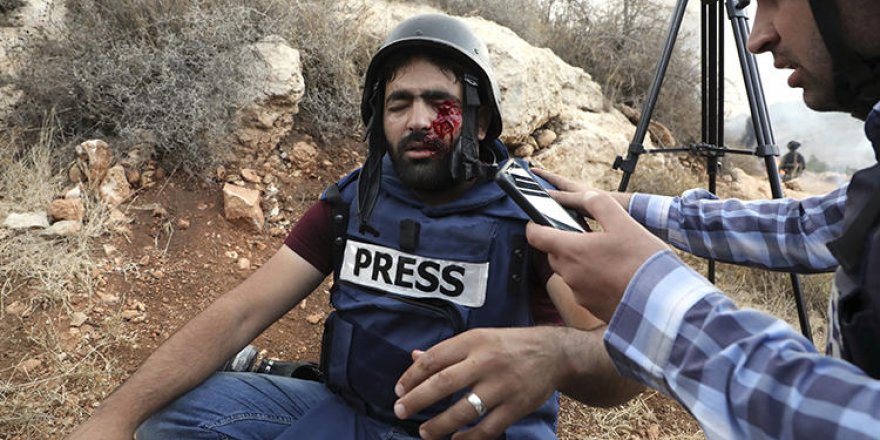 siyonist israil ordusu filistinli gazeteciyi hedef aldi 01