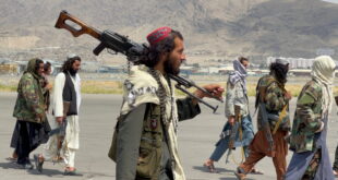 Taliban forces patrol at a runway a day after U.S troops withdrawal from Hamid Karzai International Airport in Kabul