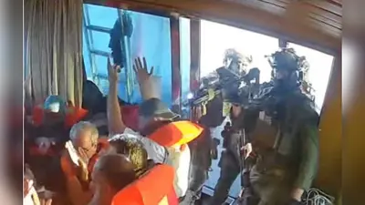 a screengrab from a live stream video shows israeli navy forces aboard the gaza bound vessel florida part of the global sumud flotilla which flotilla organisers report has been intercepted 1759388956550 16 9